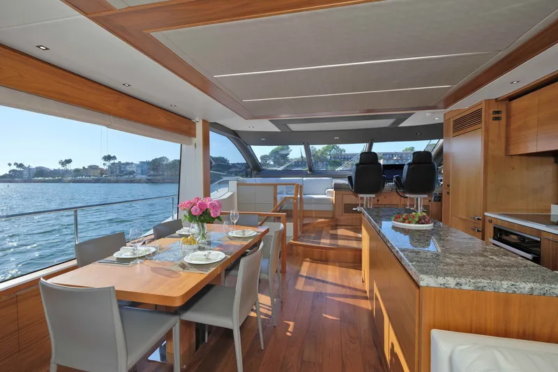 Slide: The Image of Luxurious interior of 2018 Sunseeker 76 Yacht with elegant dining area and panoramic views. - 26