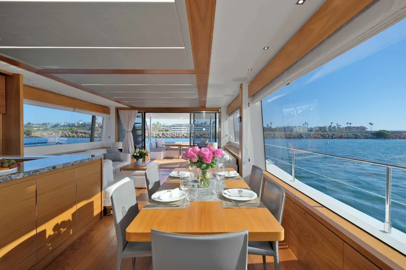 Slide: The Image of Luxurious interior of 2018 Sunseeker 76 Yacht with elegant dining area and ocean view. - 11