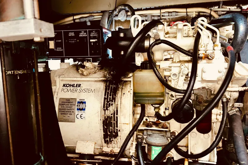 Slide: The Image of Engine room of a 2001 Luhrs 40 Convertible with Kohler power system. - 21