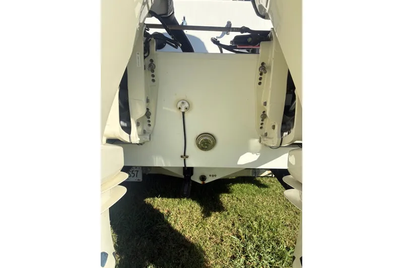Slide: The Image of Rear view of a 2000 Cape Horn 27XS boat, showing dual outboard motors. - 20