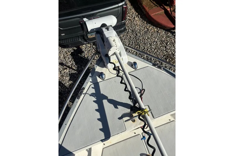Slide: The Image of Bow of 2000 Cape Horn 27XS boat with mounted trolling motor. - 27