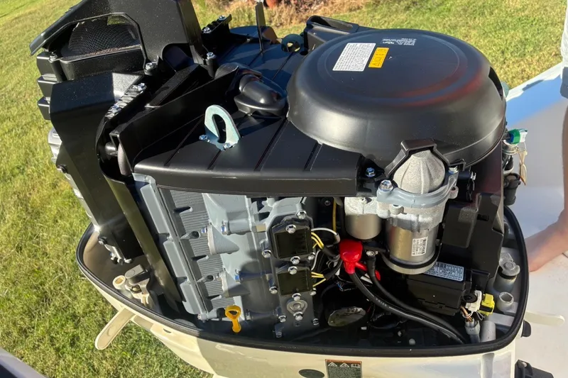 Slide: The Image of Close-up of a Cape Horn 27XS 2000 boat engine, showcasing intricate mechanical details. - 26