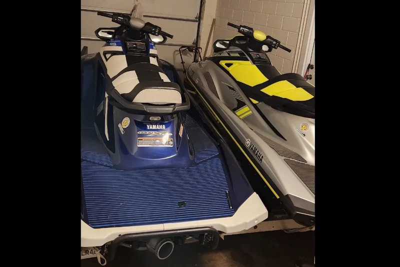 Slide: The Image of 2020 Yamaha WaveRunner VX Cruiser HO jet skis in a garage setting. - 3