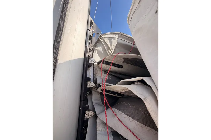 Slide: The Image of Close-up of a 2020 Lagoon 42 sailboat mast and sail rigging. - 120