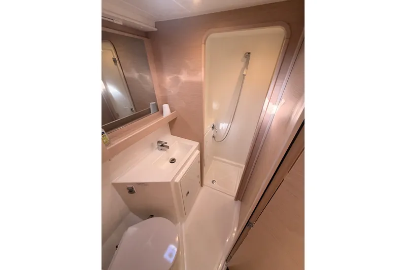 Slide: The Image of Modern bathroom in 2020 Lagoon 42 yacht with shower and sink. - 66