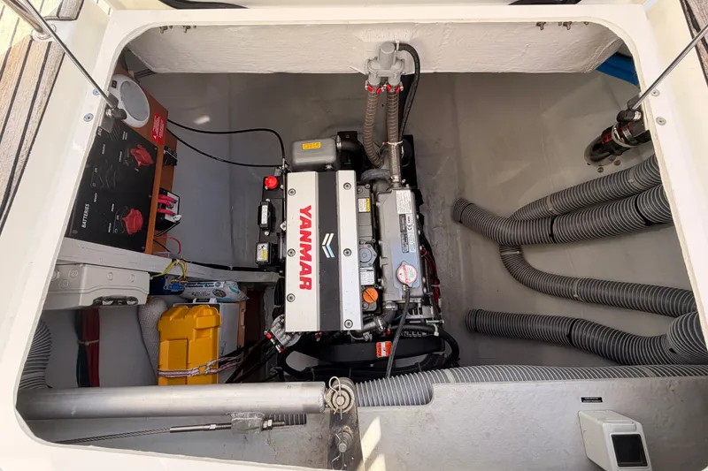 Slide: The Image of Engine compartment of a 2020 Lagoon 42 catamaran featuring a Yanmar engine. - 109