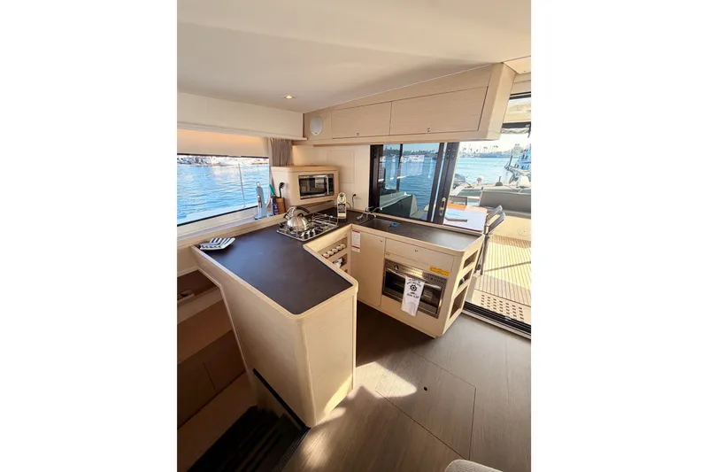 Slide: The Image of Modern kitchen interior of 2020 Lagoon 42 yacht with ocean view. - 53