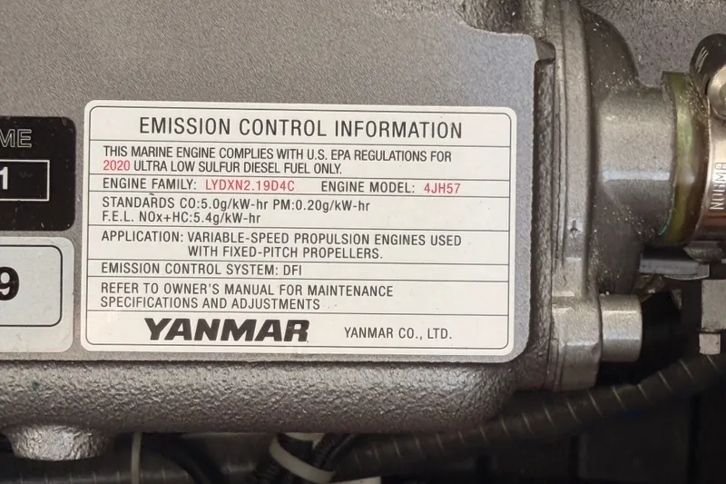 Slide: The Image of Emission control label on a 2020 Lagoon 42 marine engine by Yanmar. - 104