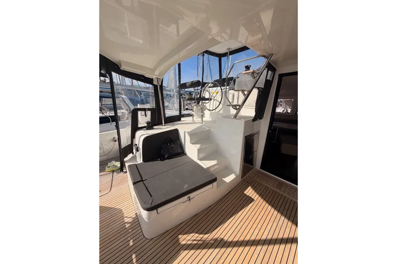 Slide: The Image of Interior view of 2020 Lagoon 42 catamaran with seating and helm station. - 31