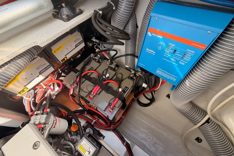 Slide: The Image of Electrical system of a 2020 Lagoon 42 yacht, featuring batteries and a Victron Energy inverter. - 107