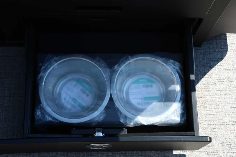 Slide: The Image of Two stainless steel bowls in a drawer on a boat. - 47