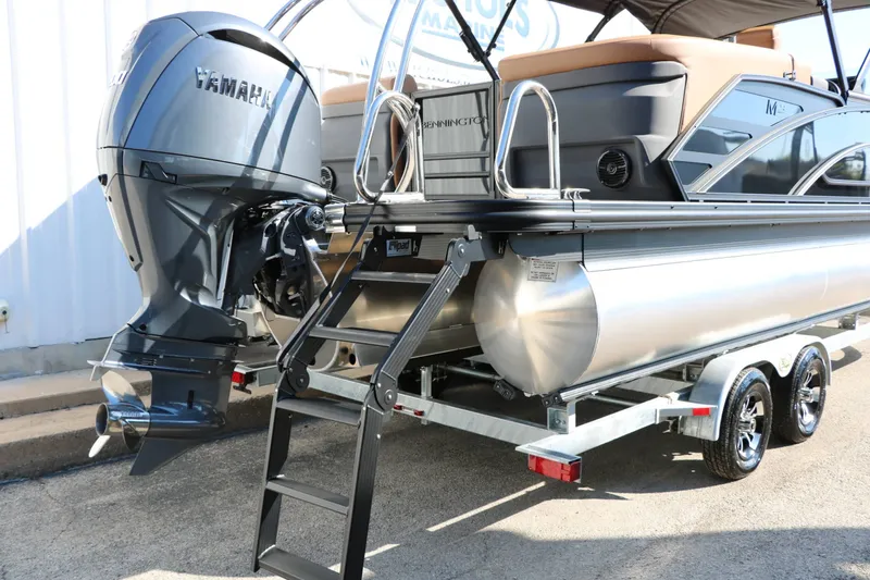 Slide: The Image of Bennington 23 MFB Tri Toon 2027 with Yamaha outboard motor and ladder on trailer. - 30