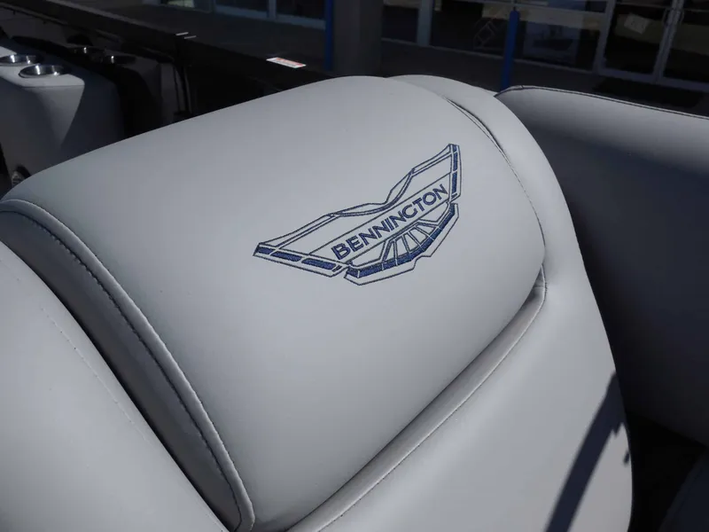 Slide: The Image of Close-up of a seat with the Bennington logo on a boat. - 30