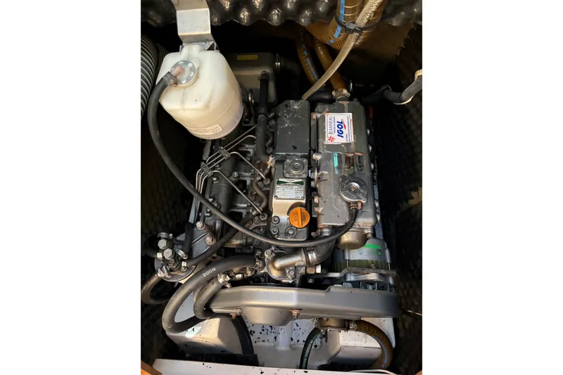 Slide: The Image of Engine compartment of a 2007 Jeanneau Sun Odyssey 42 DS sailboat, showcasing detailed components. - 20
