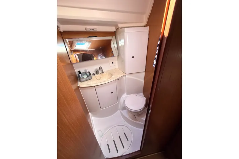 Slide: The Image of Bathroom interior of 2007 Jeanneau Sun Odyssey 42 DS yacht, featuring sink and toilet. - 19