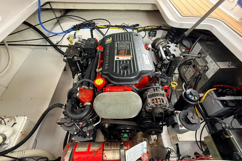 Slide: The Image of Engine compartment of a 2009 Four Winns 278 Vista boat, featuring a Volvo Penta engine. - 36