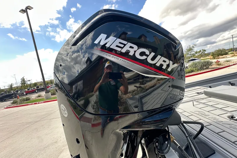 Slide: The Image of Mercury FourStroke engine on 2027 Tracker Bass Tracker 175 CC boat, outdoor setting. - 14