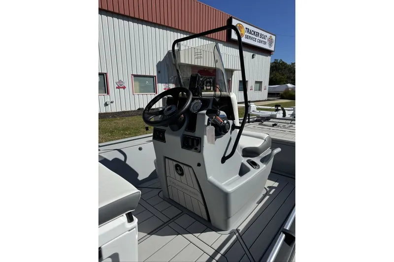 Slide: The Image of 2027 Tracker Bass Tracker Classic CC boat console at service center. - 26
