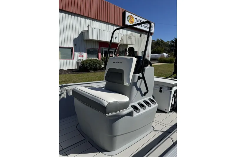 Slide: The Image of 2027 Tracker Bass Tracker Classic CC boat interior with seating and rod holders. - 25
