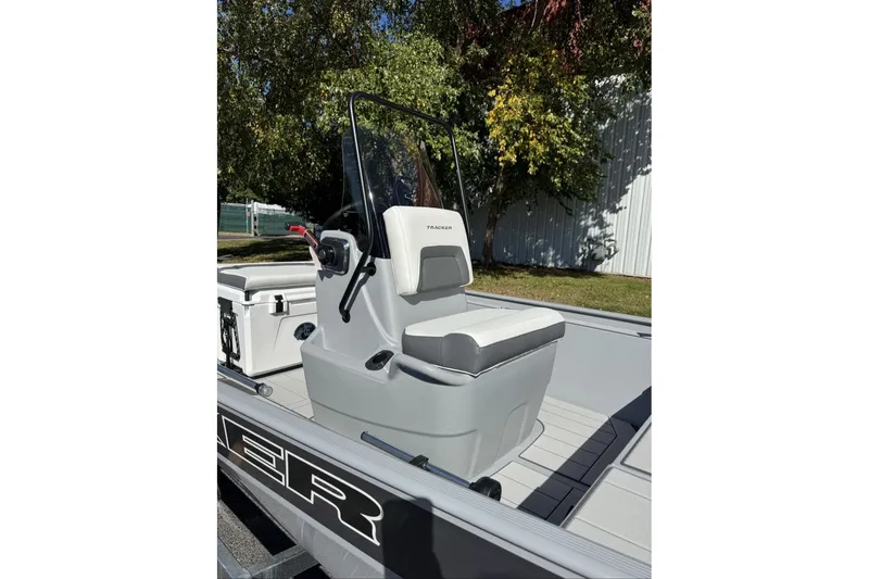 Slide: The Image of 2027 Tracker Bass Tracker Classic CC boat interior with seating and console. - 23