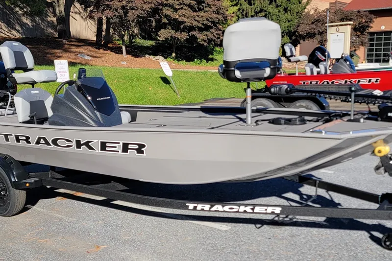 The Image of 2027 Tracker Pro 170 boat on display outdoors, featuring sleek design and comfortable seating. - 0