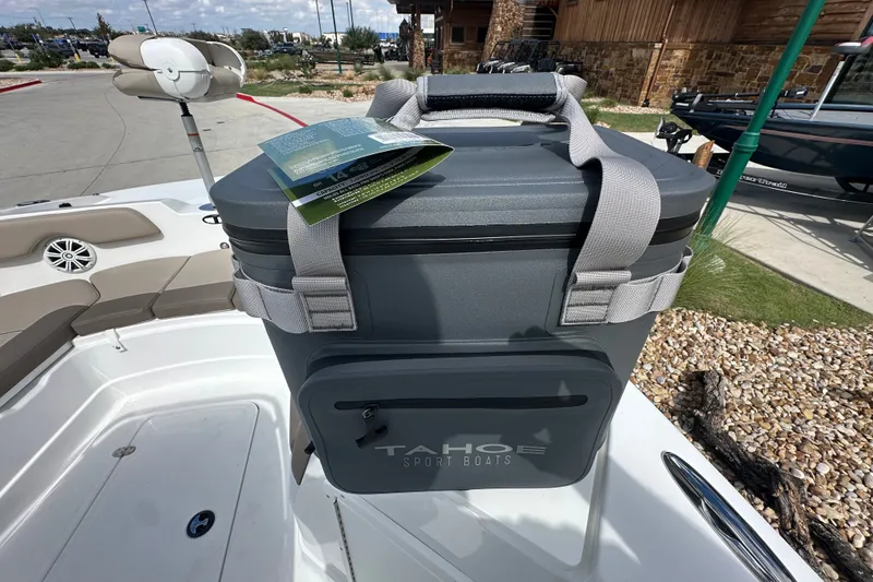 Slide: The Image of Cooler on 2027 Tahoe 2150 CC boat deck, sunny day, outdoor setting. - 28
