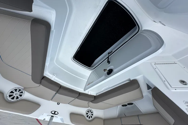 Slide: The Image of Interior view of 2027 Tahoe 2150 CC boat with seating and storage compartments. - 20