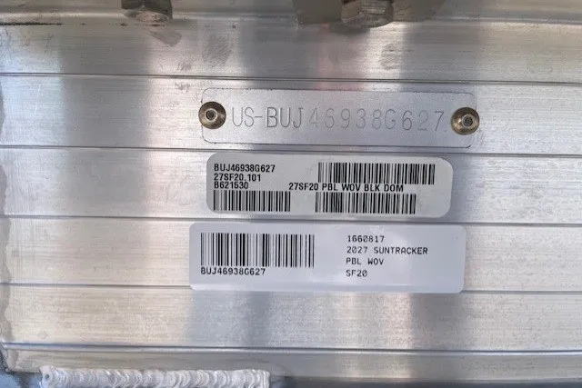 Slide: The Image of 2027 Sun Tracker SportFish 20 DLX identification plate with serial numbers and barcodes. - 14