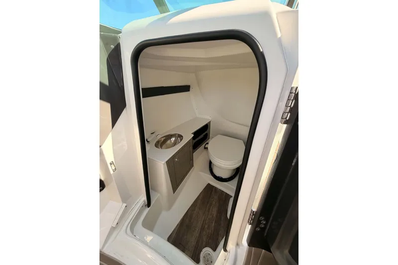 Slide: The Image of 2024 MONTERY 278ss boat interior bathroom with sink and toilet. - 22