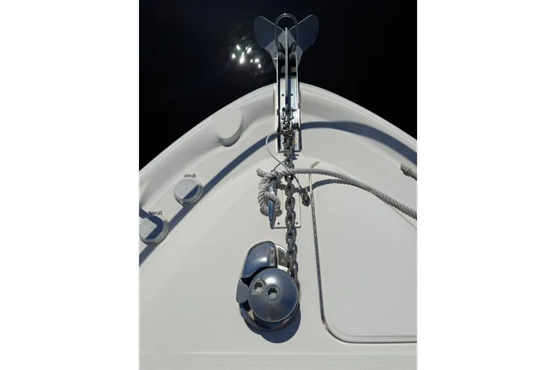 Slide: The Image of Bow view of 2005 Sea Ray 340 Sundancer with anchor and chain mechanism. - 11