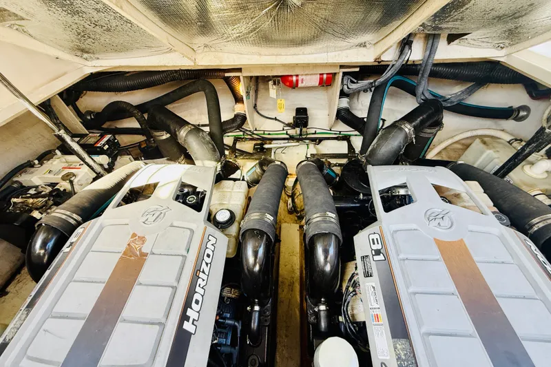 Slide: The Image of Engine compartment of a 2005 Sea Ray 340 Sundancer with Horizon engines. - 68