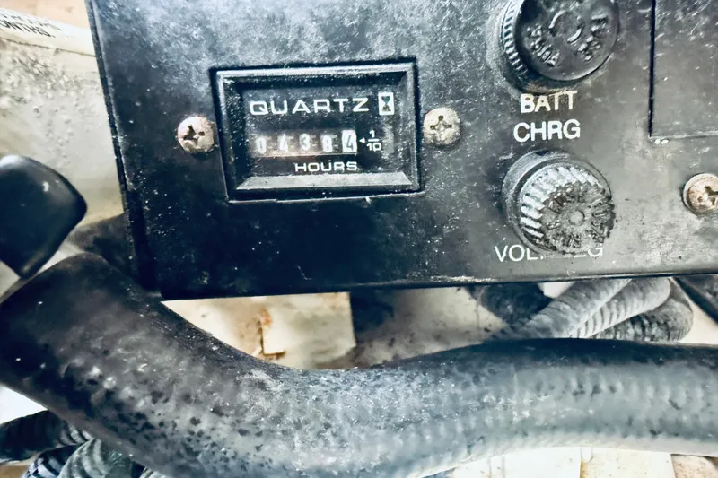 Slide: The Image of Hour meter and controls on a 2005 Sea Ray 340 Sundancer boat. - 72