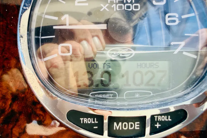 Slide: The Image of Close-up of 2005 Sea Ray 340 Sundancer dashboard showing 13 volts and 1027 hours. - 65