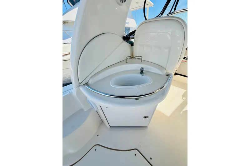 Slide: The Image of 2005 Sea Ray 340 Sundancer boat interior sink with chrome accents. - 25