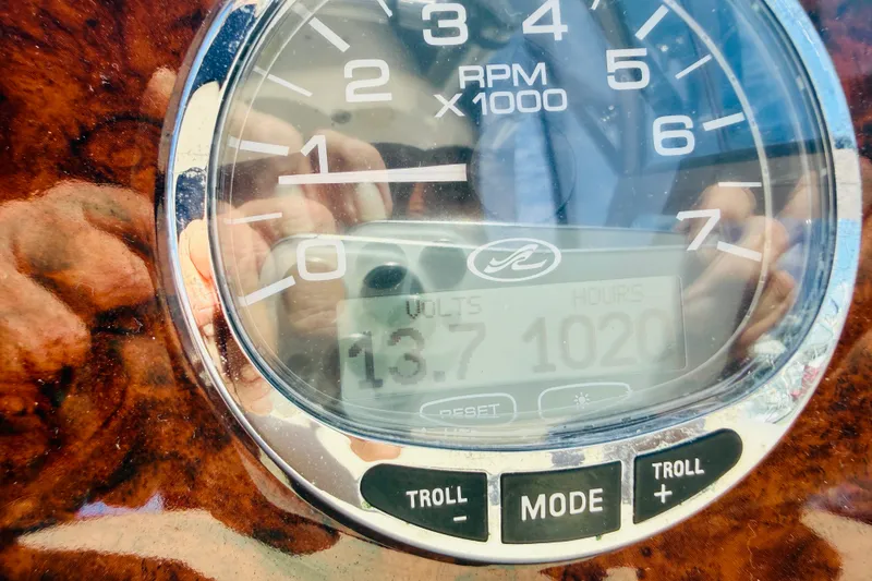 Slide: The Image of Close-up of a 2005 Sea Ray 340 Sundancer tachometer displaying RPM and engine hours. - 66
