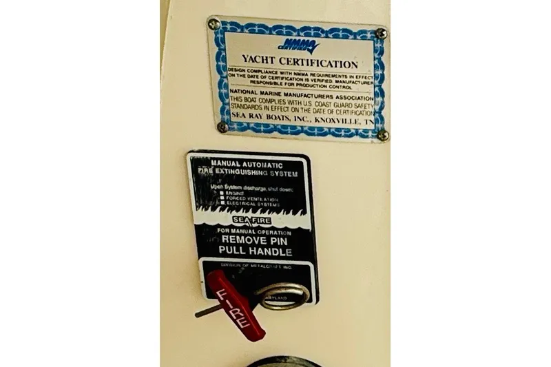 Slide: The Image of Yacht certification and fire extinguisher system on 2005 Sea Ray 340 Sundancer. - 77
