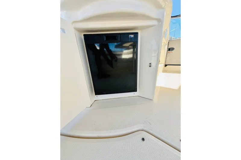 Slide: The Image of 2005 Sea Ray 340 Sundancer interior with built-in mini fridge. - 26