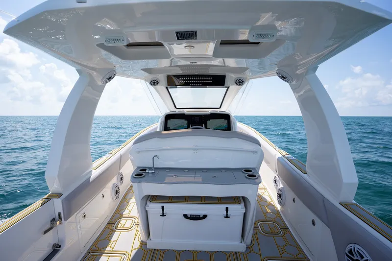Slide: The Image of 2025 Deep Impact 369 Sport boat interior with ocean view, featuring sleek design and modern amenities. - 17