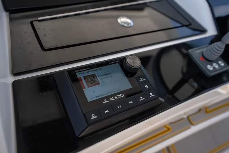 Slide: The Image of Control panel of 2025 Deep Impact 369 Sport boat with JL Audio system. - 20