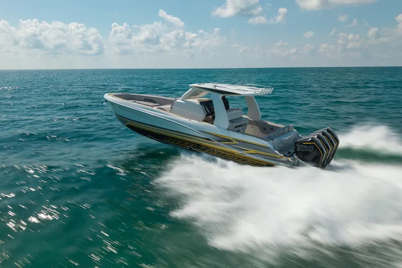 Slide: The Image of 2025 Deep Impact 369 Sport boat speeding on open ocean waters. - 6