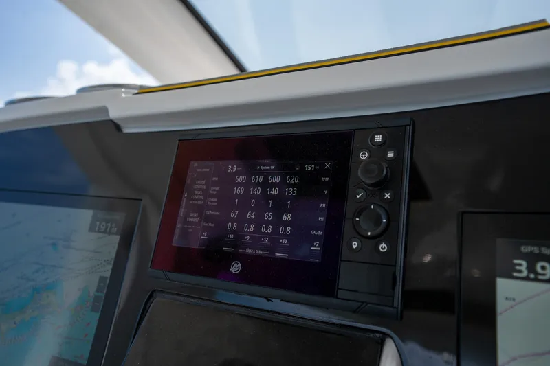 Slide: The Image of 2025 Deep Impact 369 Sport dashboard with digital display and navigation controls. - 21