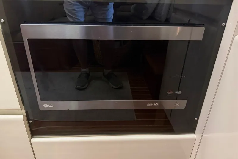 Slide: The Image of LG microwave oven in a 1990 Viking 44 Motor Yacht kitchen. - 42