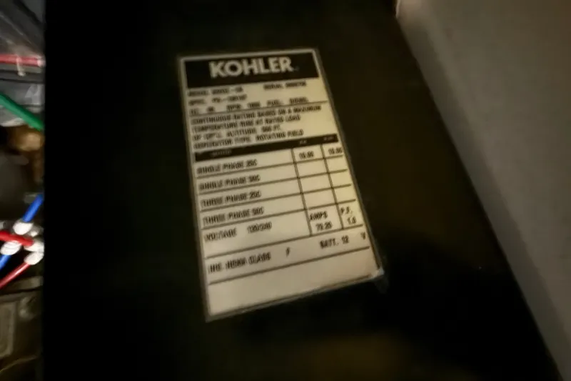 Slide: The Image of Label on Kohler generator inside 2001 Carver 506 Motor Yacht engine room. - 48