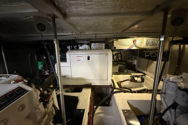 Slide: The Image of Engine room of 2001 Carver 506 Motor Yacht with Kohler power system. - 40