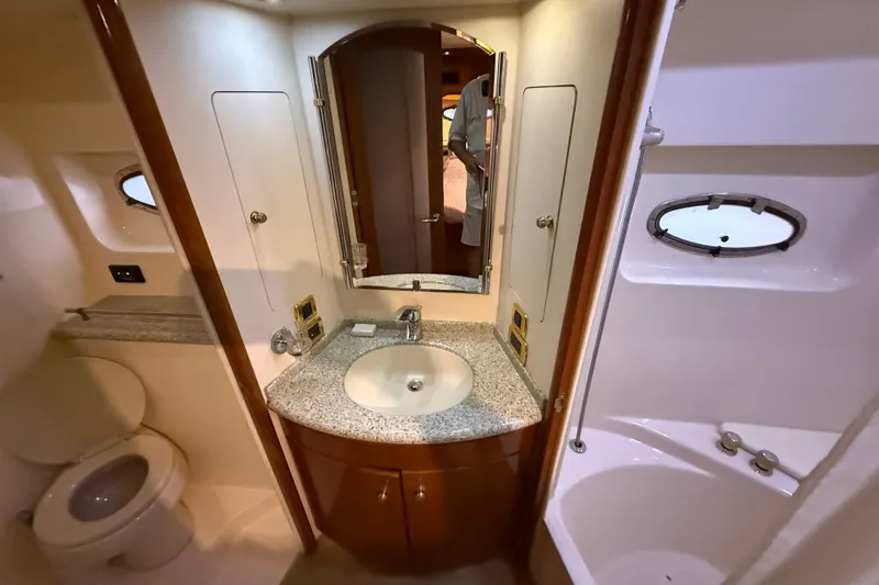Slide: The Image of Bathroom interior of 2001 Carver 506 Motor Yacht with sink, toilet, and shower. - 30