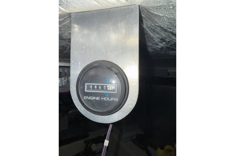 Slide: The Image of Engine hour meter displaying 8634 hours on a 2001 Carver 506 Motor Yacht. - 58