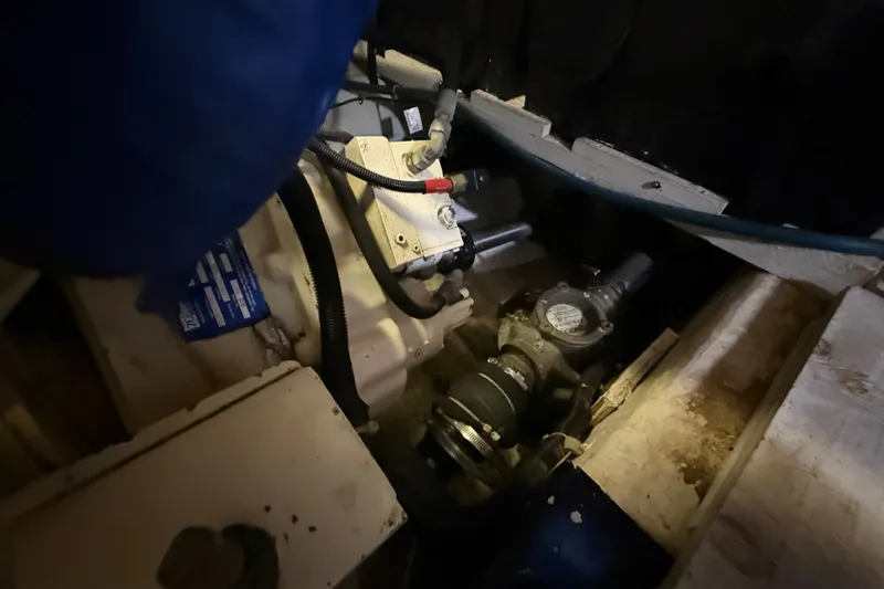 Slide: The Image of Engine compartment of a 2001 Carver 506 Motor Yacht, showcasing mechanical components. - 45