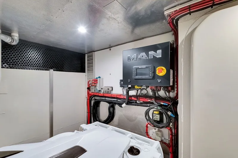 Slide: The Image of Engine room of 2021 Steeler 60S yacht with MAN control panel and wiring. - 118