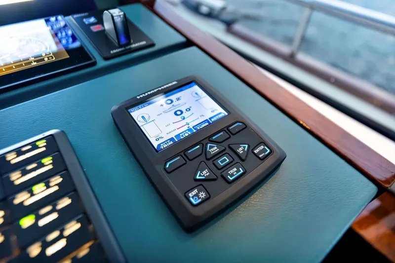 Slide: The Image of Control panel of a 2021 Steeler 60S yacht, featuring advanced navigation technology. - 82