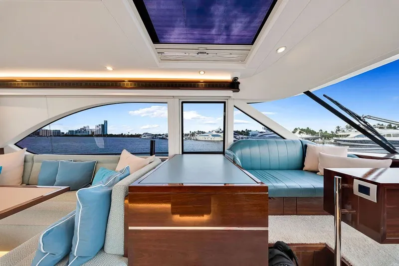 Slide: The Image of Luxurious interior of 2021 Steeler 60S yacht with elegant seating and scenic water view. - 75